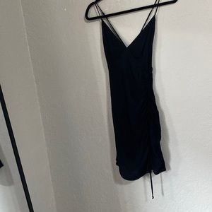 Cotton candy LA Black mini dress with rouching on one side. Never worn.